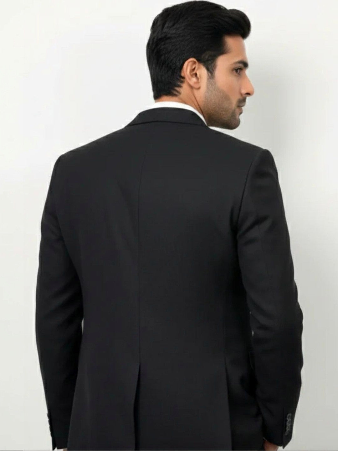 The Classic Black Three-Piece Suit