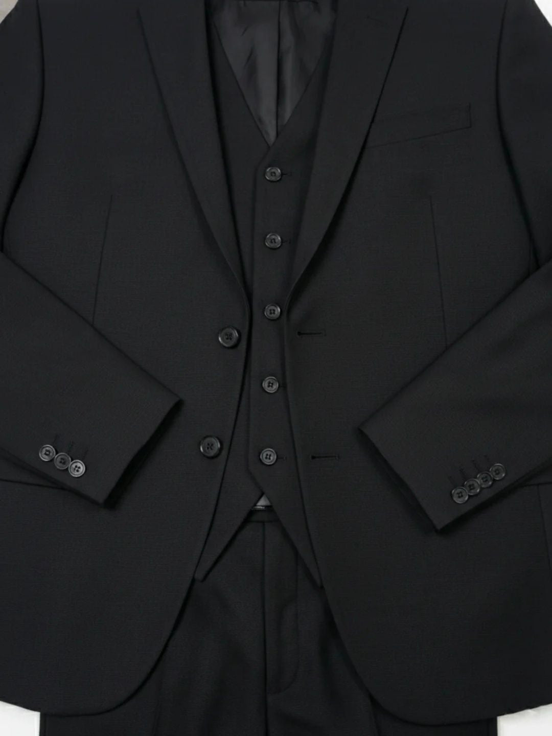 The Classic Black Three-Piece Suit